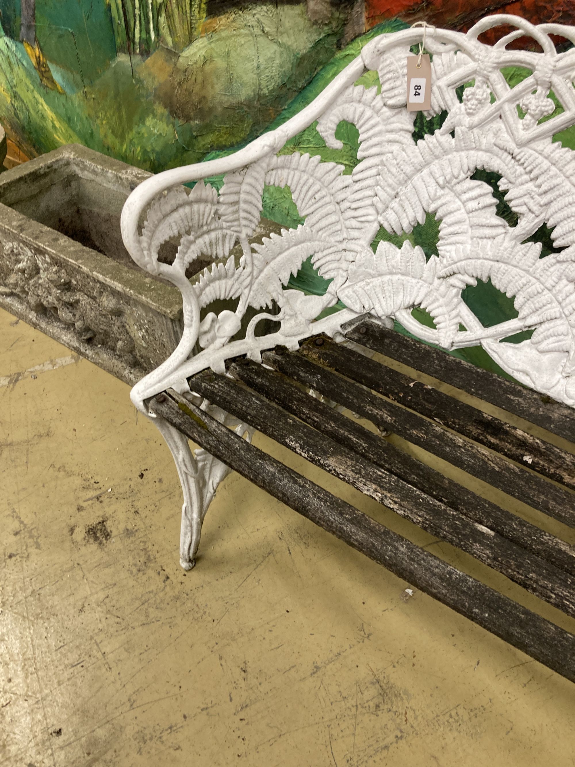 A Coalbrookdale style painted cast metal garden bench, length 113cm, depth 48cm, height 88cm